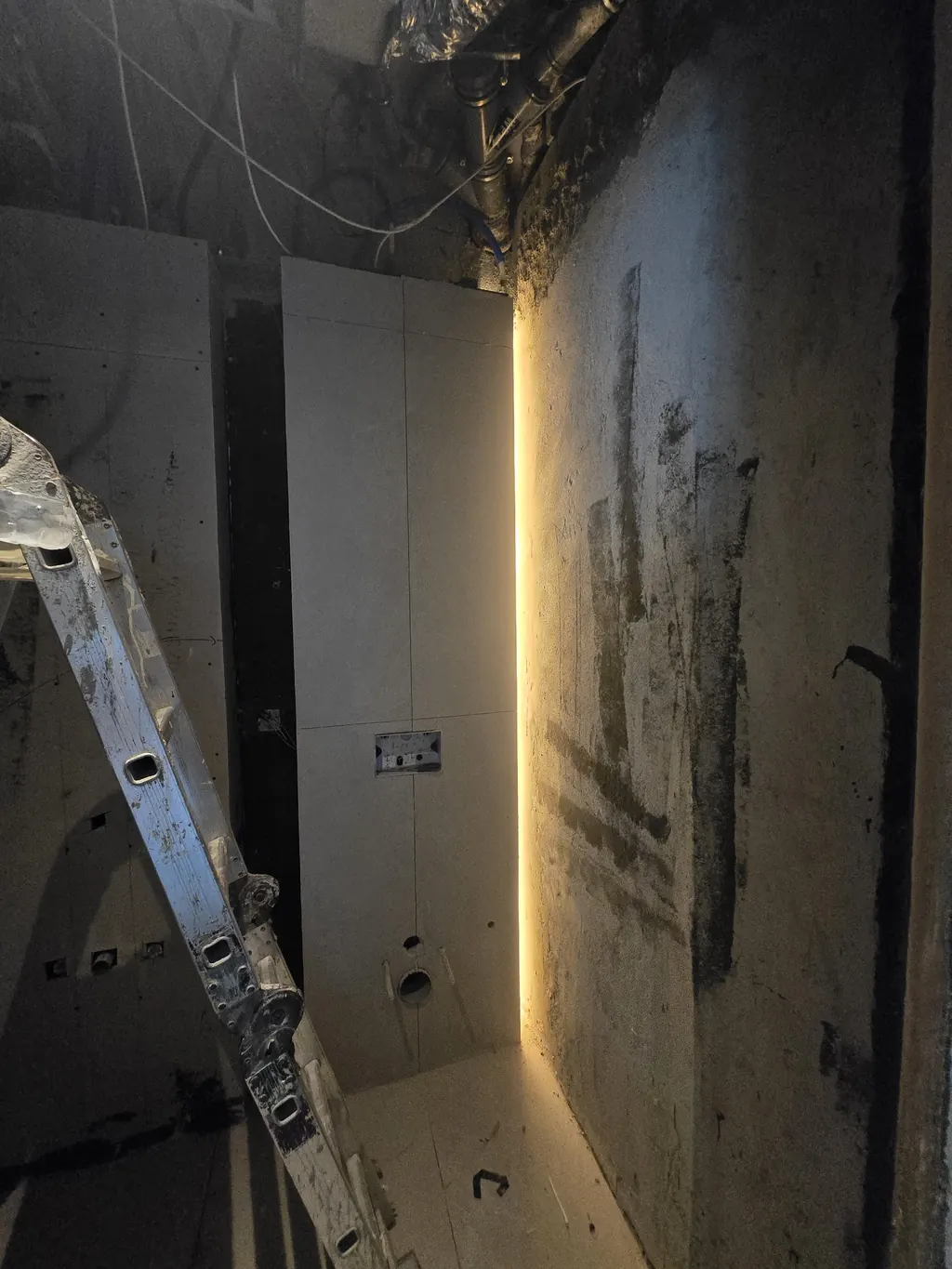 A lit channel tested in a new wall before the finishes